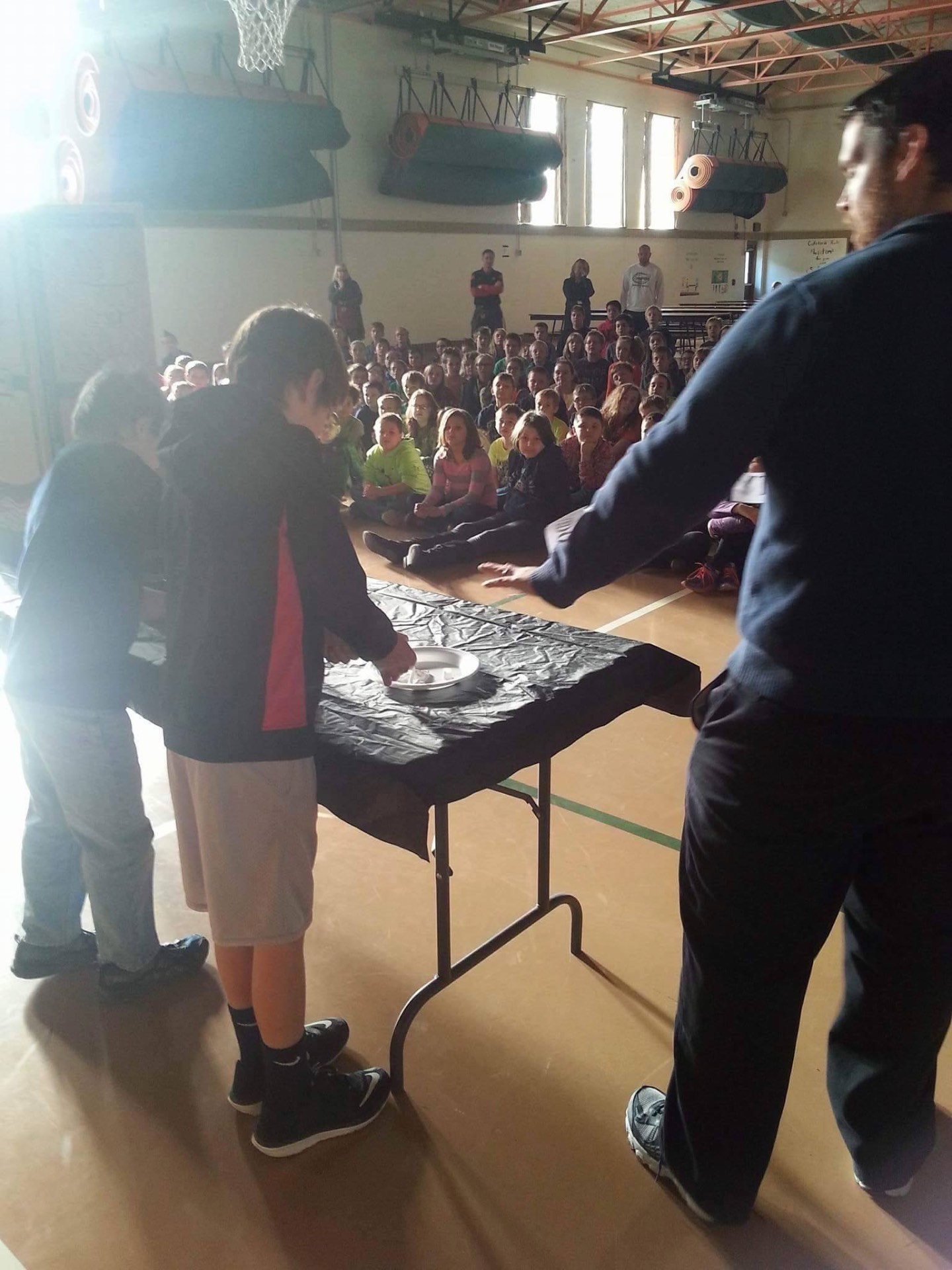 Justin leading a hands-on demonstration for elementary students